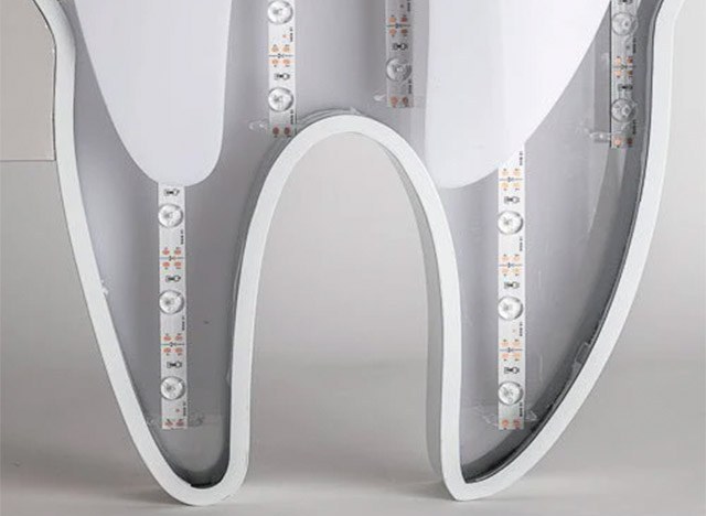 BANDEROLA-LUMINOSA-MUELA-DENTISTA-IMPRESA