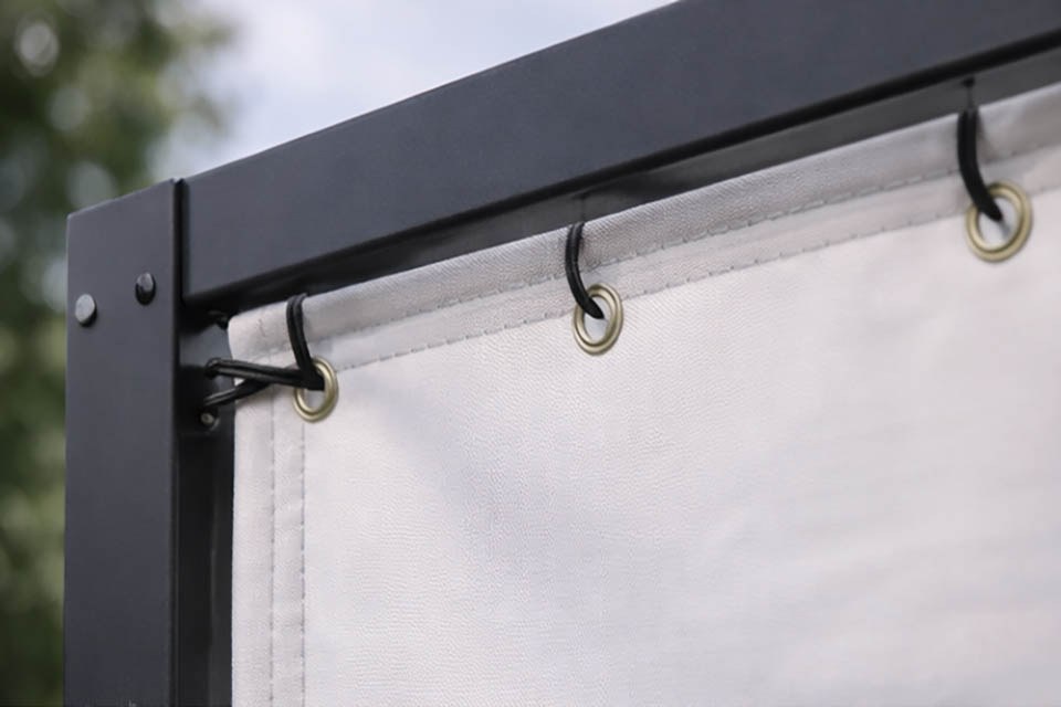 detalle de lona para pérgola con refuerzo perimetral y ollados